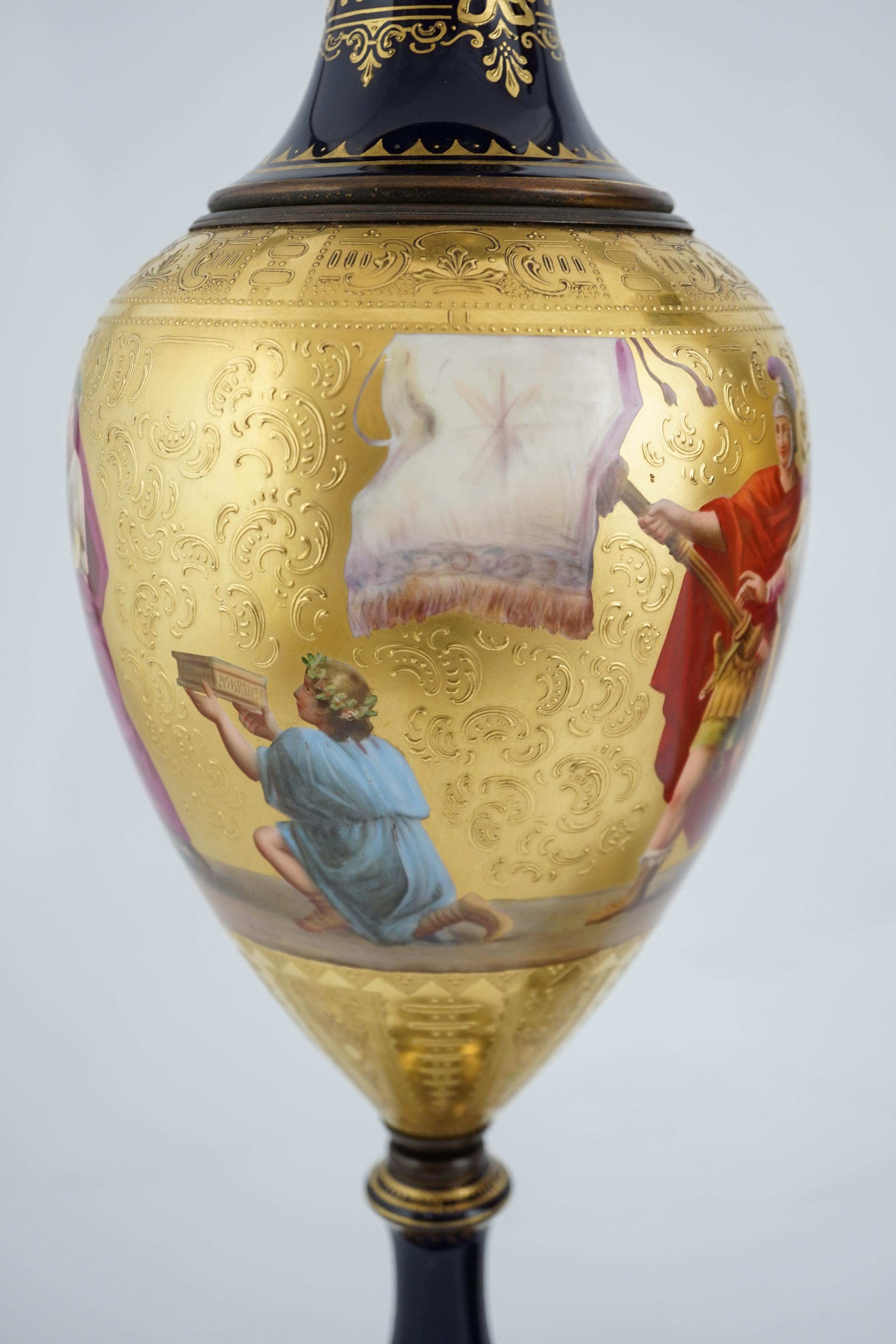 A pair of tall Vienna style porcelain vases and covers, early 20th century